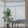 Folding Medical Examination Bed With Gray Mattress White Frame And Wheels In Indoor Setting