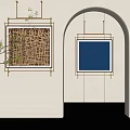 Two Abstract Paintings Hanging On White And Black Brick Walls With Archway And Gold Frames