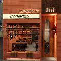 Red Brick Cafe Storefront Featuring Glass Windows Signboard Tables Chairs Inside At Night Plaza Streetlights