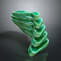 Green Sculptural Structure With Stacked Curved Layers And Polished Green Surface