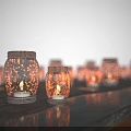Glass Jar Candle Lamps Lighting Combination With Warm Ambient Light Arranged On Tabletop