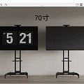 Two 70 Inch TVs on Black Stands in Room With White Wall and Wooden Floor