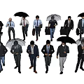 Group of People Walking with Umbrellas in Different Clothing Styles