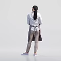 A Casual Woman Wearing Gray Apron Holding Notebook And Pen Standing Calmly
