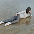 Woman Lying on Wooden Floor Wearing White Top Gray Leggings and White Socks