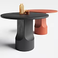Modern Round Dining Tables With Black And Orange Column Bases And Decorative Items 3d model