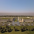 Modern Industrial Park With Green Roofs Central Road And Landscaped Trees