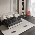 Modern Double Bed with Black Comforter Nightstands Orange Chair and Wooden Floor in Bright Bedroom