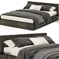 Modern Double Bed With Gray Headboard White Mattress Gray And White Pillows And Striped Duvet