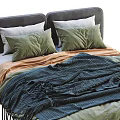 Modern Double Bed With Gray Headboard Green White Pillows And Blue Orange Blankets