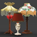 Classic Table Lamps Featuring Golden Fringed Red Fabric Floral Shades Red White Dark Twisted Bases