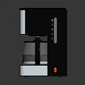 Sleek Modern Black And Silver Coffee Maker With Stainless Steel Body And Glass Carafe