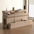 Beige Wavy Design Display Cabinet With Perfume Bottles Decorative Items And Candles In Bright Room