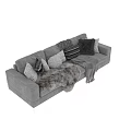 Cozy Gray Three Seater Sofa With Decorative Pillows And Faux Fur Throws