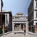 Traditional Pai Fang Archway In Historic Street With Classical Buildings And Pedestrians