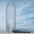 Modern Streamlined Museum Building Featuring Tall Curved Glass Structure And Lower Base Design