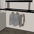 Wall Mounted Clothes Rack With Hanging Clothes Near Window Blinds