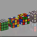 Assorted Rubik's Cubes With Colorful Faces And Detailed House Pattern Design