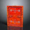 Architectural Red Carved Decorative Panel With Rivet Accents And Intricate Patterns