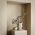 Stylish White Textured Vase With Green Leaves And Purple Blooms On Neutral Wall Side Table