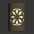 Brown Cylindrical Decorative Candle Holder Featuring Intricate Star Cutout Patterns