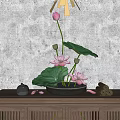 Black Vase With Pink Lotus Flowers And Green Leaves On Wooden Cabinet Gray Textured Wall
