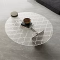 Round Transparent Glass Coffee Table With Grid Pattern Design In Modern Living Room