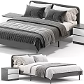 Modern Double Bed with Gray and White Bedding and Wooden Nightstands