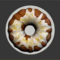 Delicious Round Bundt Cake With White Icing Drizzle On Silver Stand Against Dark Background