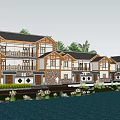 Traditional Rural Self-built Houses With Wooden Accents By Water And Greenery Reflection