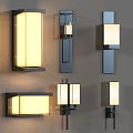 Modern Wall Lamps With Various Designs And Warm Yellow Light On Gray Wall