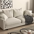 Beige Two Seater Sofa With Pillows Gray Blanket Black White Geometric Painting Wooden Floor