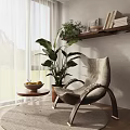 Modern Living Room Armchair With Potted Plant And Round Wooden Side Table
