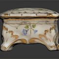Floral Decorative Porcelain Box With Blue Flower Patterns Gold Accents And Carved Legs