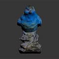 Blue Bird Sculpture With Detailed Feathers Standing On Natural Stone Base