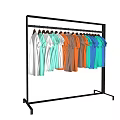 T shirts In Various Colors Hanging Neatly On Metal Clothing Rack