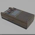 Vintage Brown Tape Recorder With Control Buttons Screen And Grid Pattern