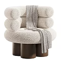 Beige Plush Accent Chair with Striped Throw Blanket and Wooden Legs Modern Cozy Design