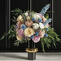 Colorful Mixed Flowers Arrangement In Black Vase With Gold Base And Green Leaves Ferns