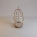 Stylish Oval Shaped Rattan Hanging Chair With White Cushion For Indoor Outdoor