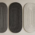 Stylish Oval Shaped Rugs in Gray Black White with Woven Texture Displayed in Row