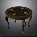 Classical Wooden Round Table with Intricate Carved Legs and Decorative Floral Patterns on Top