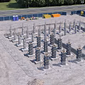 Reinforced Concrete Building Column Components With Installation Of Formwork On Prepared Foundation Of Construction Site