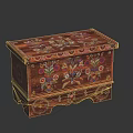 Colorful Floral Painted Wooden Chest With Decorative Patterns And Carved Feet