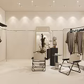 Modern Clothing Store With Glass Window Display Mannequins Hanging Clothes Pendant Lights And Green Plants