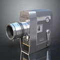 Vintage SANKYO 550 Digital Movie Camera With Silver Gray Body Lens And Control Knobs