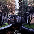 Modern Garden Landscape With Water Pond Lush Green Trees And Seating Area