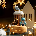 Festive Carousel Decoration With Blue Haired Figure Stars Small Houses And String Lights