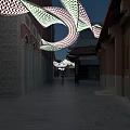 Artistic Curved Perforated Irregular Shaped Chandelier Hanging Over Rooftop Plaza