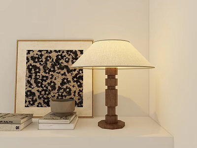 Wooden Base Table Lamp with Beige Lampshade on White Shelf Beside Decorative Painting and Books 3d model